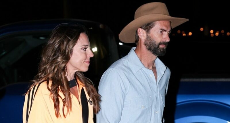 Mel C and her model boyfriend Chris Dingwall hold hands at Coachella