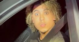 Migrant filmed hurling vile abuse at female cop and vowing to make her his 'slave' moans he is the victim of racism after being shamed over his behavior