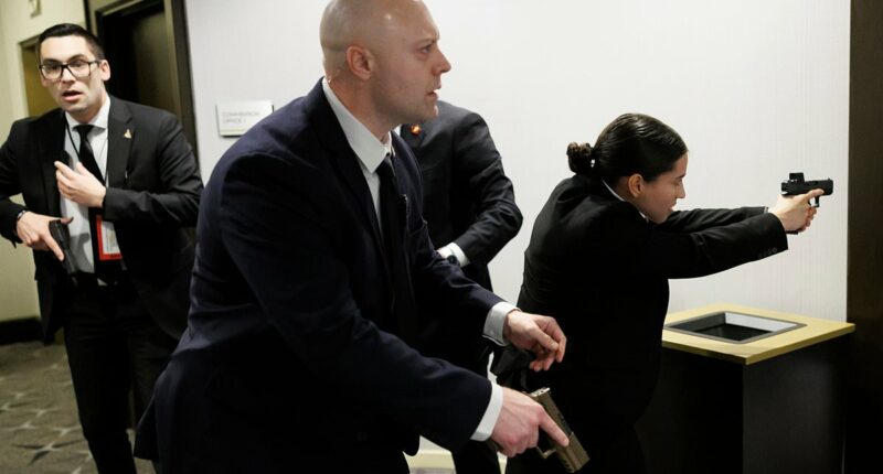 Miracle as bullet that hit man at White House dinner 'deflected by his phone'