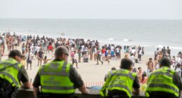 Orange Crush beach blowout nets 26 arrests, cops seize makeshift machine gun as massive crowd tests crackdown