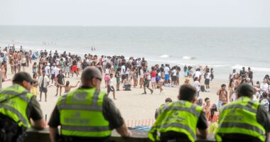 Orange Crush beach blowout nets 26 arrests, cops seize makeshift machine gun as massive crowd tests crackdown