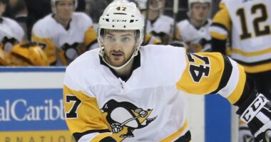 Paramedics responding to ice hockey star Adam Johnson's fatal neck injury during match were forced to climb barriers to get to him in 'chaotic scene', inquest hears