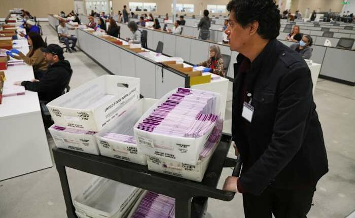 Postal Service union launches ad campaign promoting mail voting as Trump assails the method