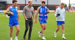 Prince Harry, center left, The Duke of Sussex, meets Western Bulldogs players during a visit to Movember at the Western Bulldogs HQ at Mission Whitten Oval, in Footscray, a suburb of Melbourne, Australia Wednesday, April 15, 2026. (Jonathan Brady/Pool Photo via AP)