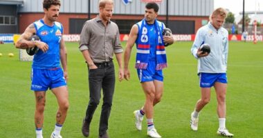 Prince Harry, center left, The Duke of Sussex, meets Western Bulldogs players during a visit to Movember at the Western Bulldogs HQ at Mission Whitten Oval, in Footscray, a suburb of Melbourne, Australia Wednesday, April 15, 2026. (Jonathan Brady/Pool Photo via AP)