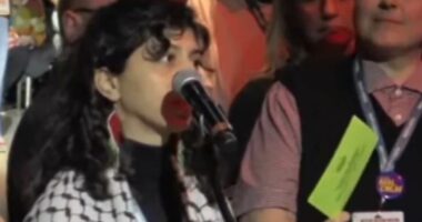 Progressive political party's conference plunged into turmoil after giving minority groups 'equity cards' to let them cut line-with trans woman furious a biological woman was allowed to go before her