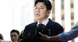 South Korean police seek to arrest K-pop mogul behind BTS