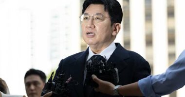 South Korean police seek to arrest K-pop mogul behind BTS