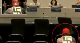 Swastika-wearing agitator makes profane gestures at LAPD officials