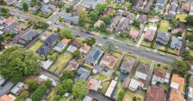 West Ryde residential suburbs of city of Ryde local streets and shopping villages in aerial top down no sky view.
