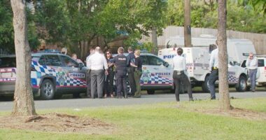 A strong police presence remains outside the Arana Hills home.