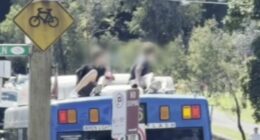Teenagers who rode on bus roof sought by police