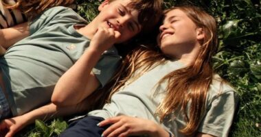 The Princess of polish! Charlotte shows off her icy blue manicure in William and Kate's new anniversary portrait - ahead of her 11th birthday