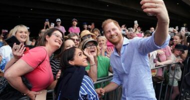 These photos of Harry and Meghan could land Aussies in hot water
