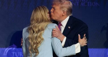 Trump embraces Erika Kirk in touching moment as he speaks at Turning Point rally... just days after she skipped event with JD Vance