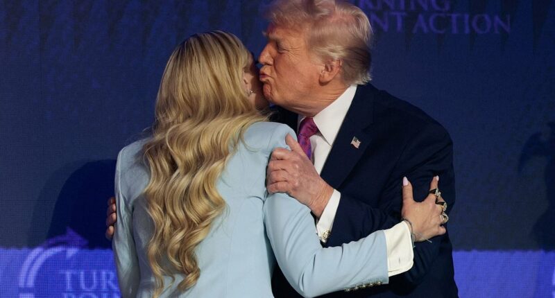 Trump embraces Erika Kirk in touching moment as he speaks at Turning Point rally... just days after she skipped event with JD Vance