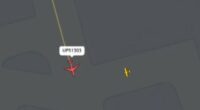 UPS jet has near miss with plane at same Kentucky airport where 14 were killed in crash as ATC shouts: 'What are you doing?'