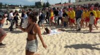 'Unbothered' Aussie steals the show from Harry and Meghan after footage captured priceless moment at the beach: 'Give her a medal'