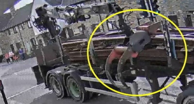 Unsecured crane swings out from lorry before killing mother