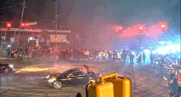 WATCH: Illegal street racing 'takeover' explodes as hundreds swarm streets and suspects bolt