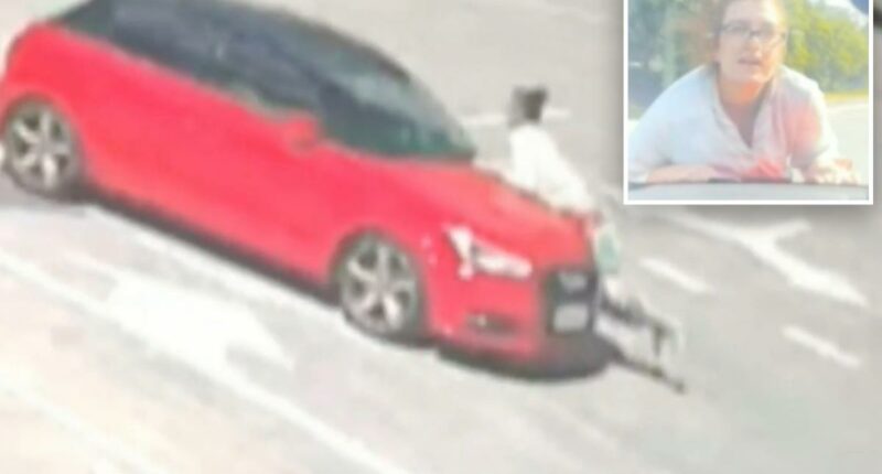Wild moment woman clings to moving car in Australian road rage incident