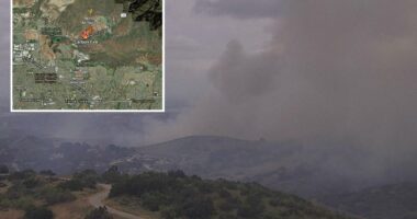 Wind fuels brush fire in OC, closing roads and forcing evacuation warnings