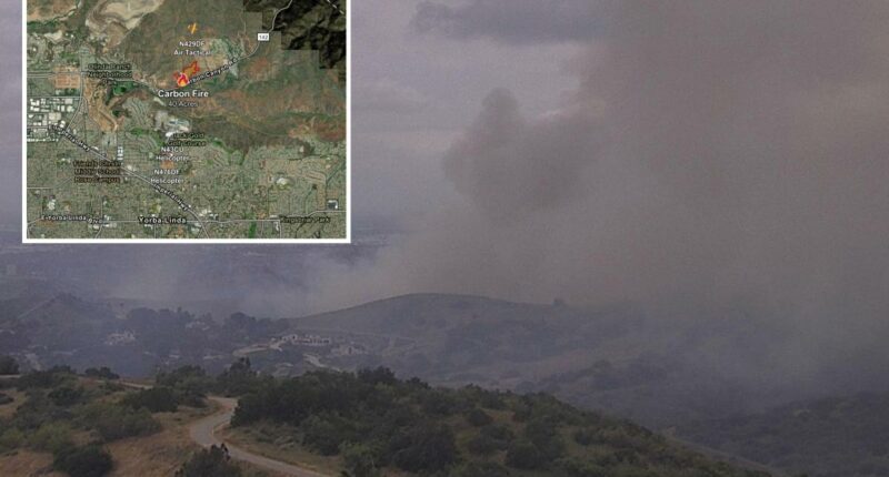 Wind fuels brush fire in OC, closing roads and forcing evacuation warnings