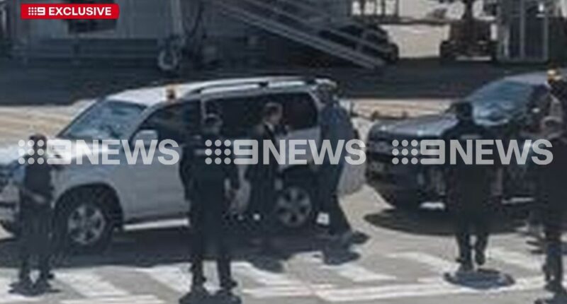 Witnesses describe moment decorated soldier was arrested at busy airport