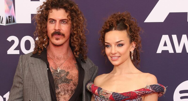 Abbie Chatfield's boyfriend Keli Holiday forced to fly home after visa revoked at US border mid-tour