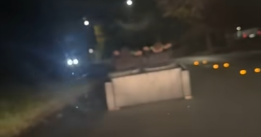 Alarming footage shows 'couch riders' driving down dark Canberra street