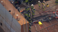 First responders were spotted near the scene of the explosion at a Staten Island, N.Y., shipyard Friday afternoon.