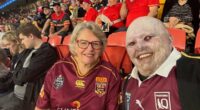 Aussie with an agonising skin condition goes to the footy with his mum - and what happened next will make your blood boil