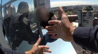 Brave cops rescue woman as she dangles from edge of NYC skyscraper