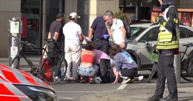 Car plows into pedestrian zone killing 2 as police detain driver and investigate motive