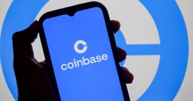 Coinbase to lay off 700 workers as cryptocurrency exchange embraces AI