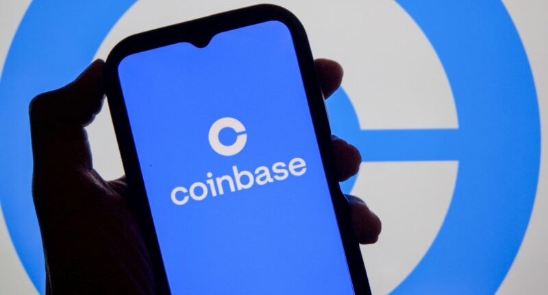 Coinbase to lay off 700 workers as cryptocurrency exchange embraces AI