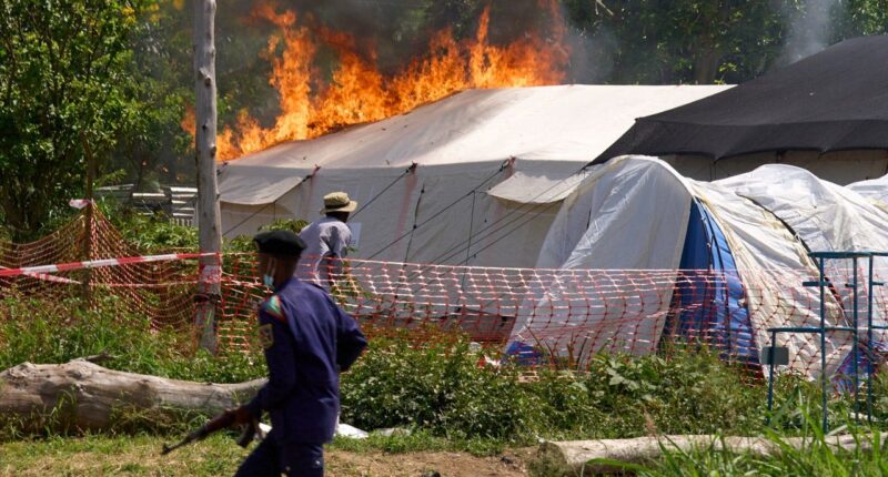 Ebola treatment center set on fire in Congo after residents clash with authorities over victim's body