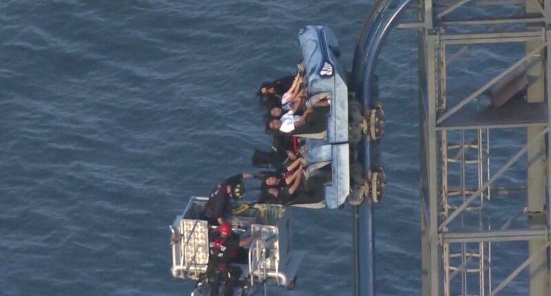 Eight riders left dangling atop 100-foot roller coaster for over three hours at Texas amusement park