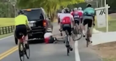 Georgia man smirks after he is charged over alleged road rage incident
