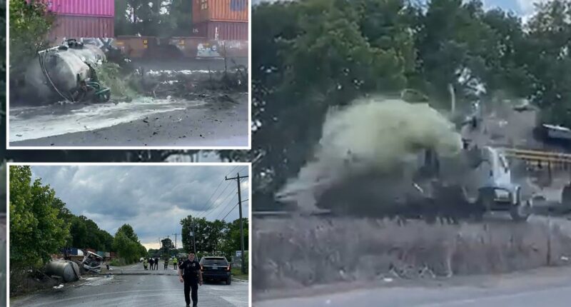 Horror as train collides with truck carrying septic tank, seriously injuring driver: video
