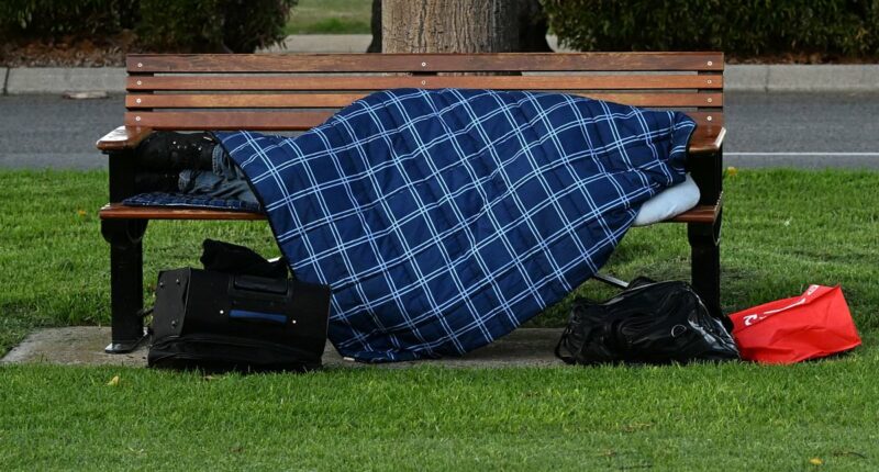 I live in a $900-a-week shoebox while homeless man sleeps in hallway