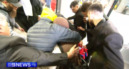 Zahra Ahmad was flanked by supporters as she left Melbourne Airport on Thursday.