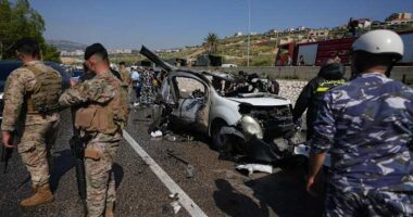 Israeli drone strikes near Beirut kill 4 and southern airstrikes kill at least 13