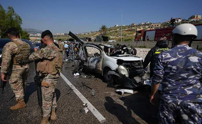 Israeli drone strikes near Beirut kill 4 and southern airstrikes kill at least 13