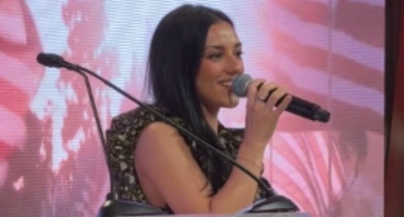 Kash Patel's girlfriend belts out the national anthem for boyfriend