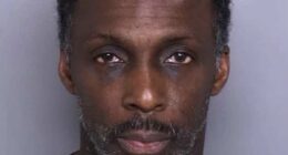 Man arrested after alleged Peeping Tom photographed students