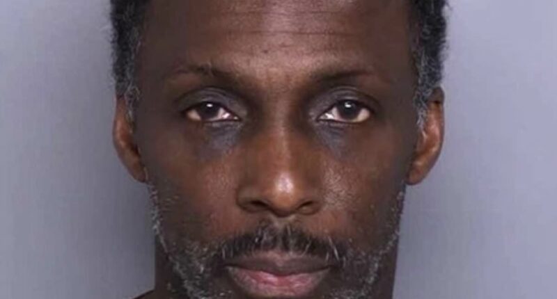 Man arrested after alleged Peeping Tom photographed students