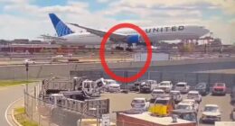 Moment United flight hits light pole and truck while landing