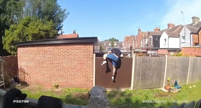 Moment drug boss flees through gardens to escape armed police