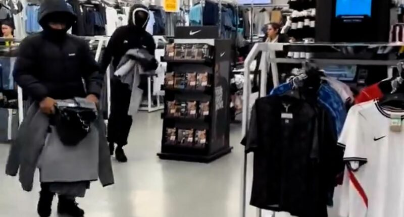 Moment youths ransack store - before workers battle to reclaim clothes